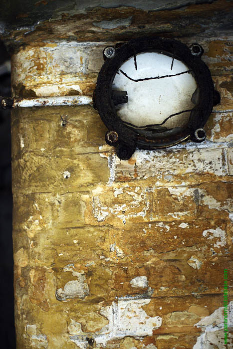 flaking paint and an old light socket